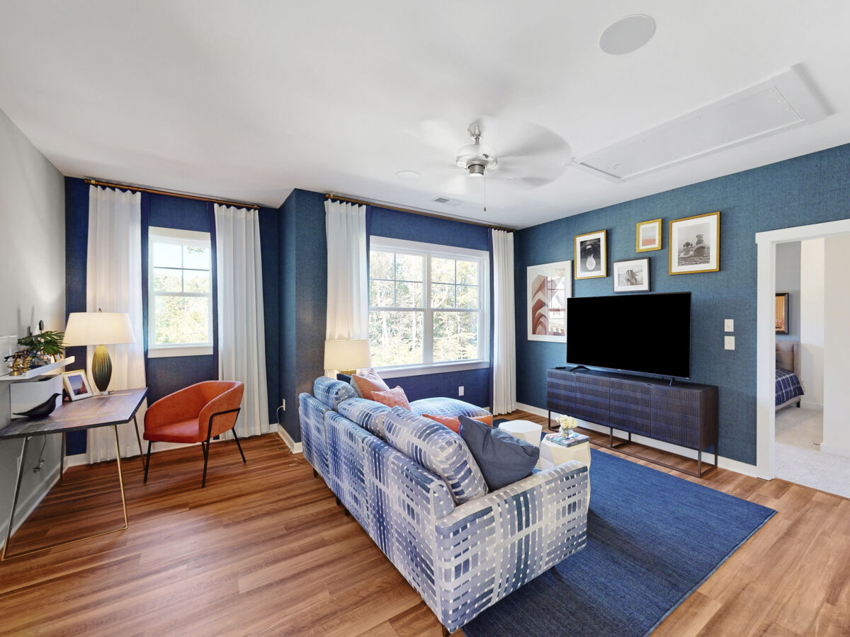 Blue grasscloth full-room wallcovering installation in a living room, Utah