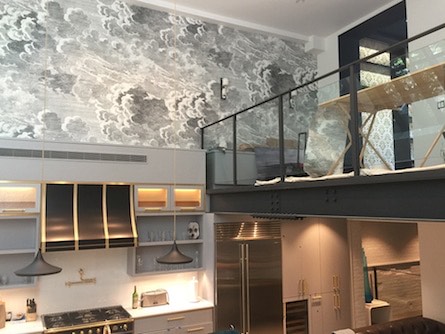 Cloud mural on a double-height kitchen loft wall, Utah