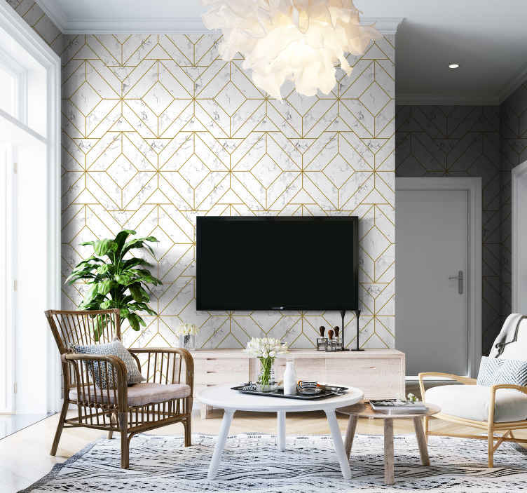 Gold geometric art deco wallpaper on a living room media wall, installed by Mancini Wallpapers