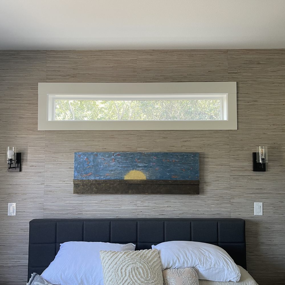 Grasscloth headboard wall with transom window, bedroom installation, Utah