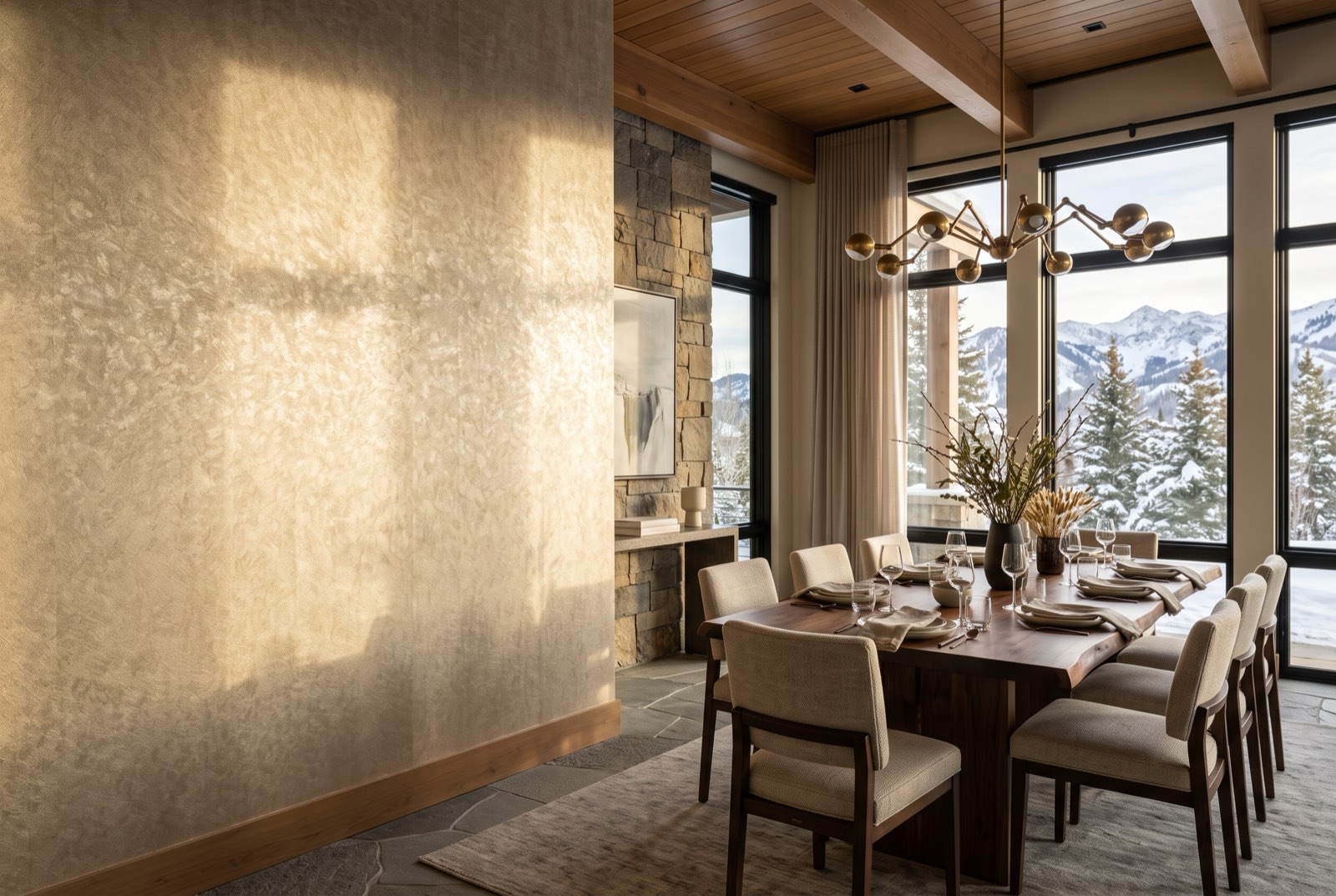 Champagne mica wallcovering across a dining room in raking afternoon light, Park City, Utah