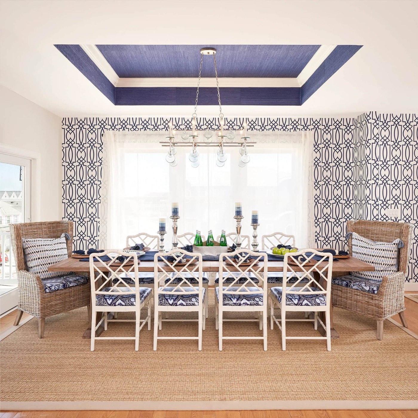 Dining room with navy trellis wallpaper and a blue grasscloth ceiling, installed by Mancini Wallpapers, Utah