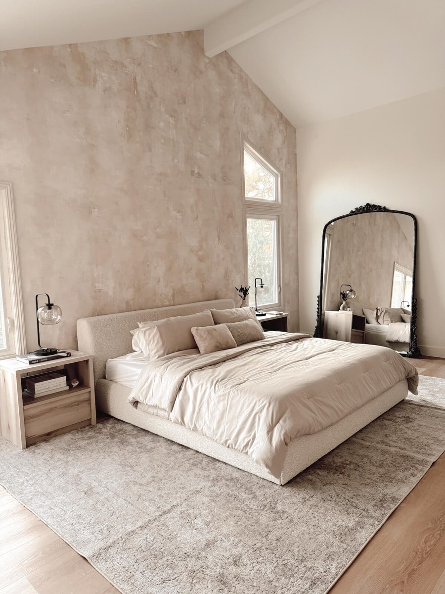 Textured plaster-effect accent wall in a luxury bedroom, Utah, installed by Mancini Wallpapers