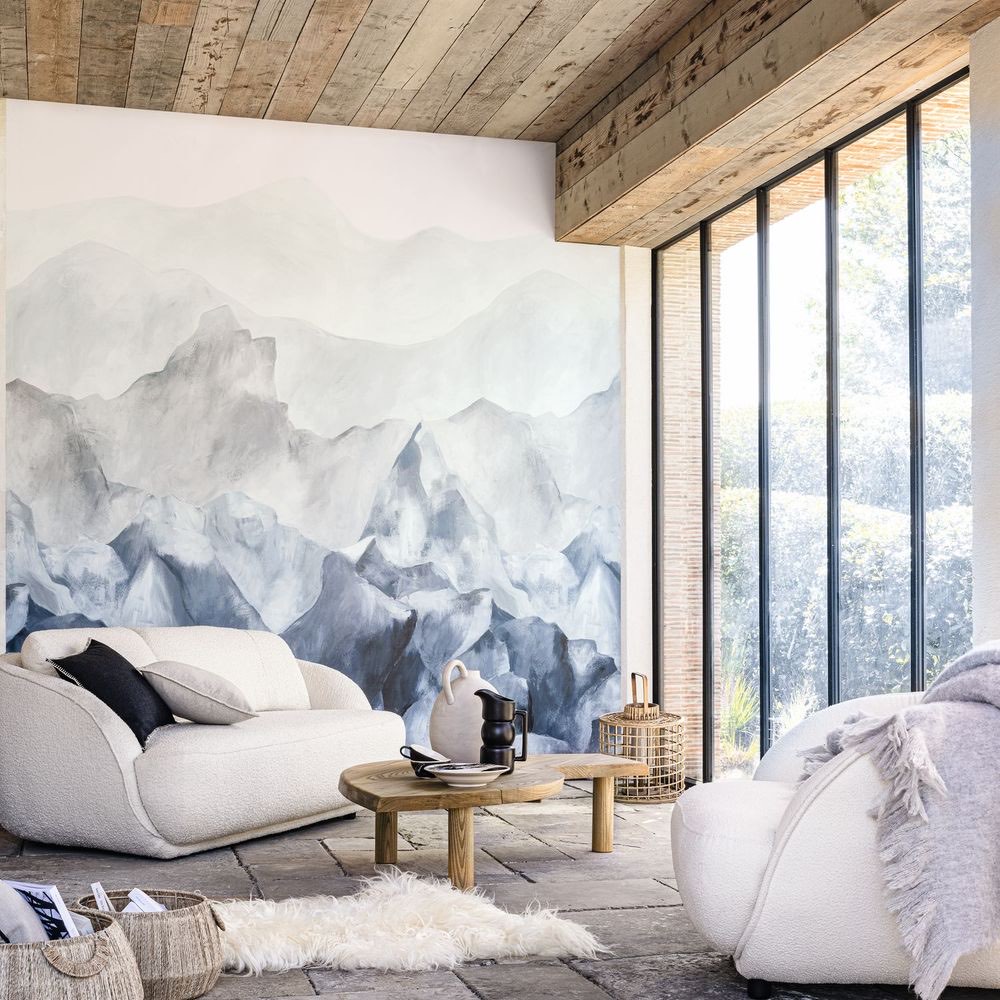 Watercolor mountain mural across a living-room wall with reclaimed-wood ceiling, luxury home, Salt Lake City, Utah