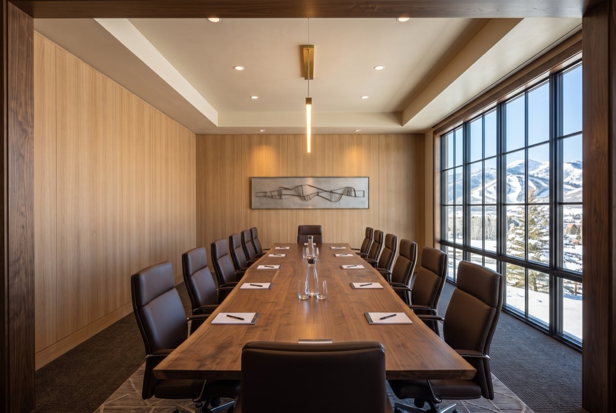 Rift-cut oak veneer wallcovering across a boardroom wall, Park City office, Utah